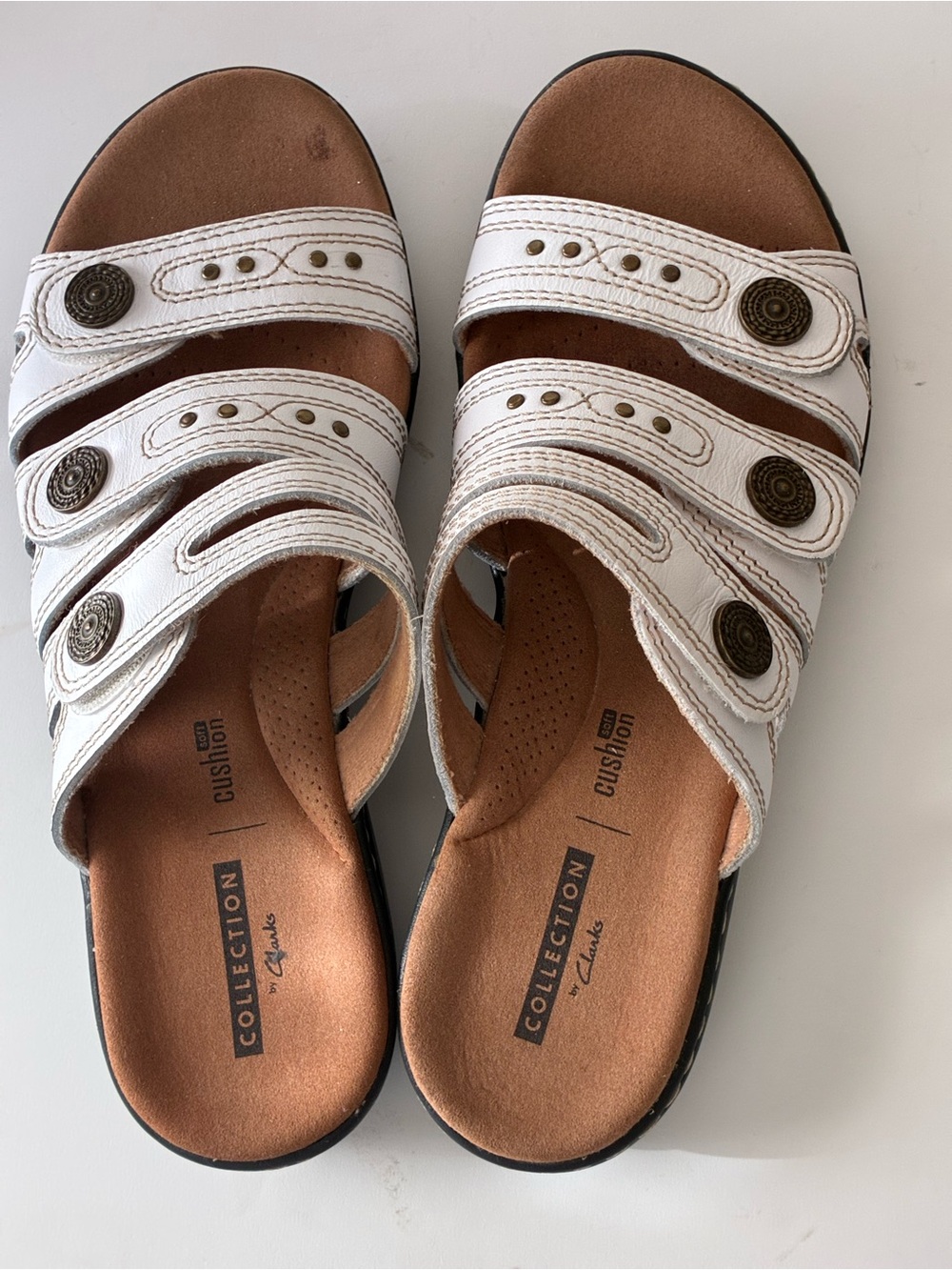 Clarks White Multi-Strap Slip-On Sandals with Decorative Studs